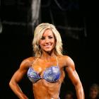 Kristi   Tauti  - IFBB Sacramento Pro  2009 - #1